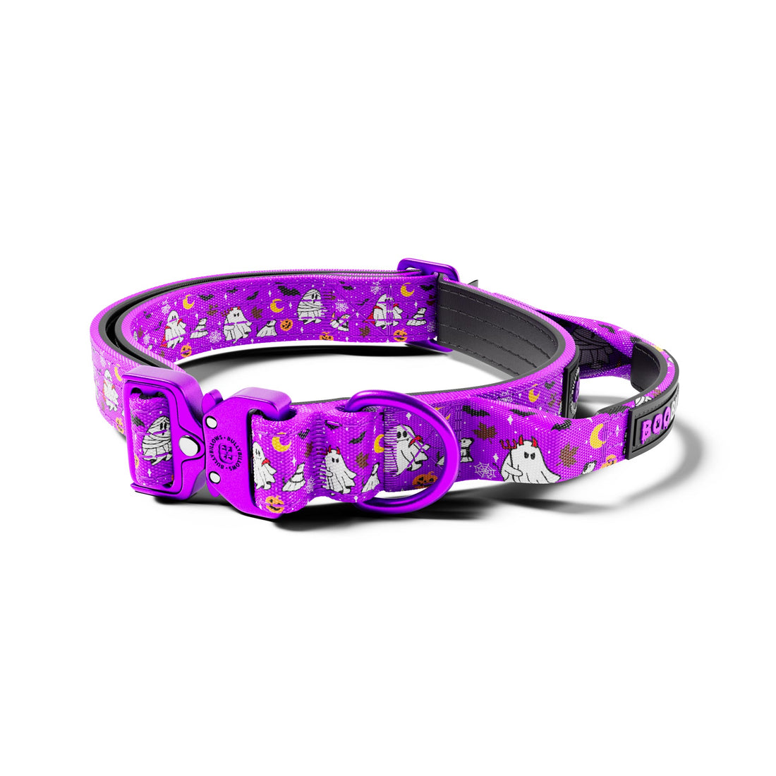A purple dog collar with a Halloween-themed pattern of white ghosts, black bats, and yellow moons, shown on a clean white background.