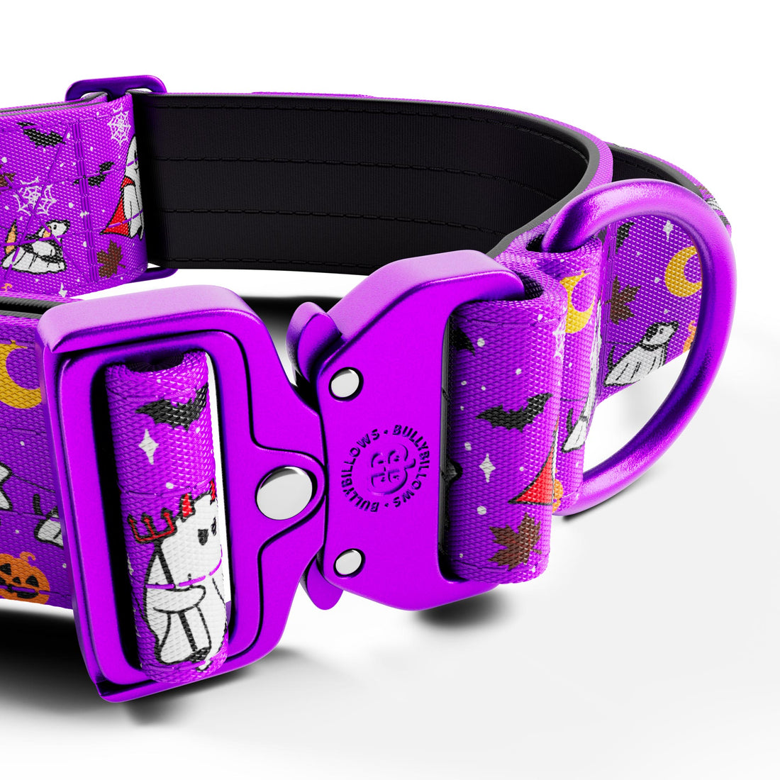 A close-up of a purple pet collar with a matching plastic buckle. The fabric strap features a Halloween-themed print with a white ghost, black bat, orange jack-o'-lantern, yellow crescent moon, and stars on a white background.