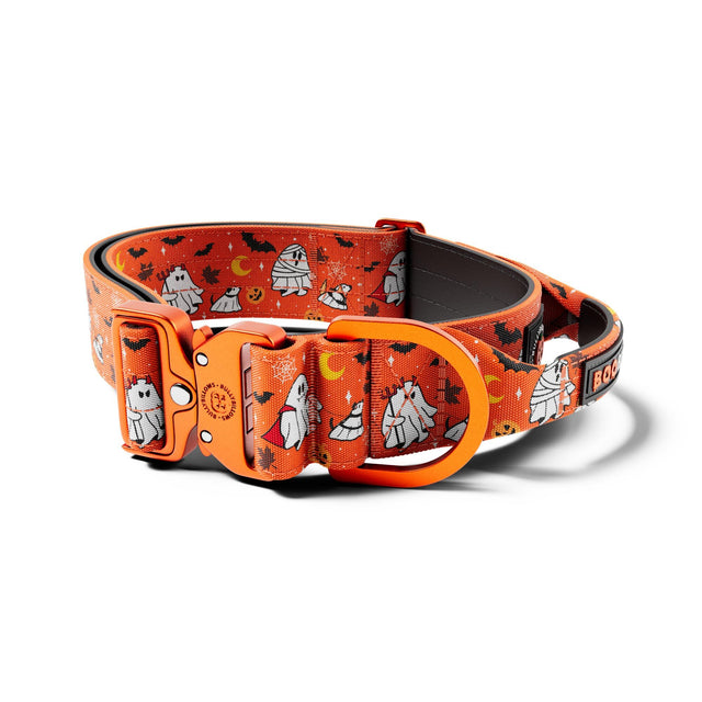 Halloween-themed dog collar with ghost and pumpkin design on an orange background