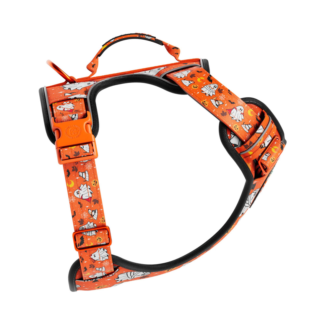 An orange dog harness with a Halloween-themed print of ghosts, pumpkins, and bats, featuring black padded interior and adjustable plastic buckles, shown on a solid white background.